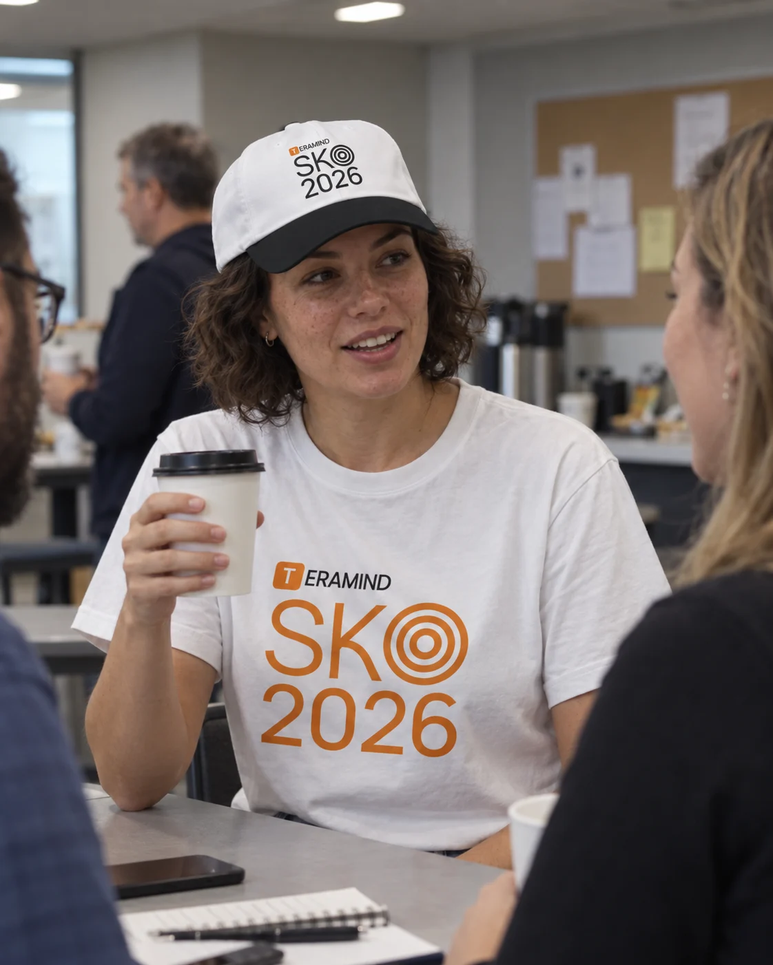 A coworker wearing Teramind SKO 2026 apparel during a workshop break.