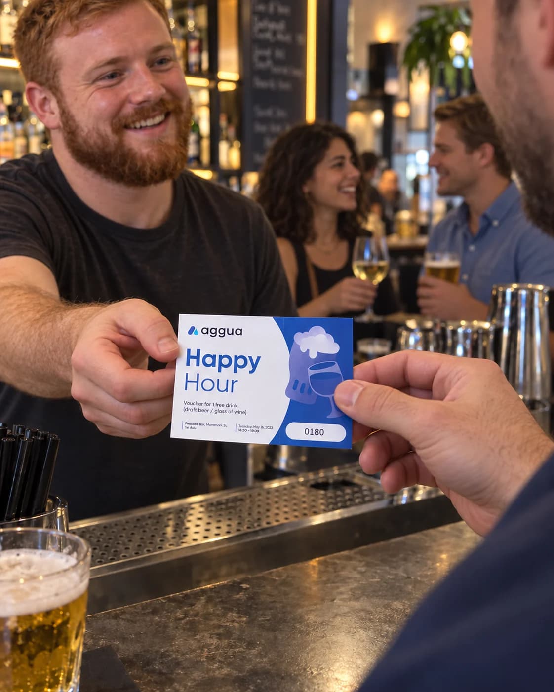 An Aggua happy-hour voucher exchanged at a bar with varied patrons.